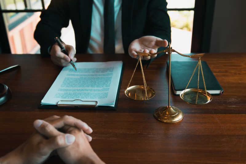 business-lawyer-is-currently-counseling-the-client-QTYZRWE (1)